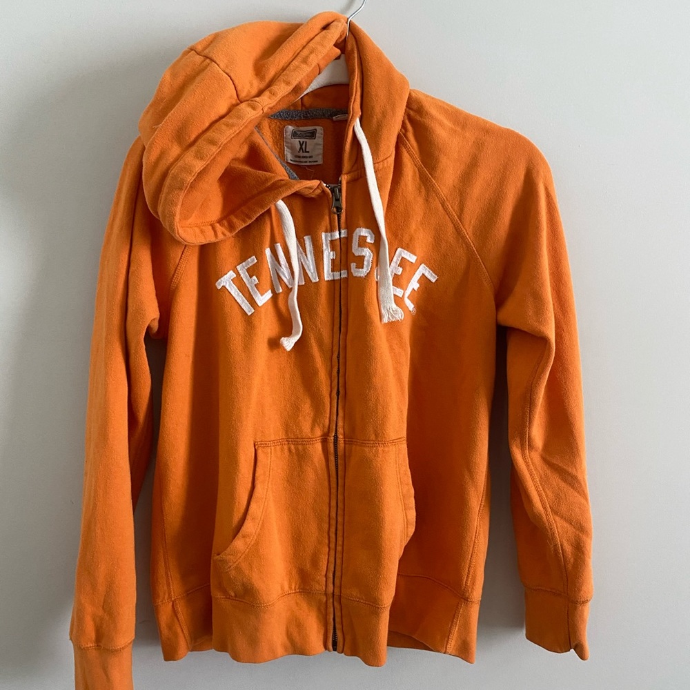Bright orange Tennessee zip up jacket.